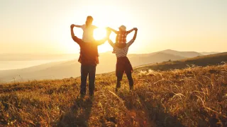 Family in Field at Sunset