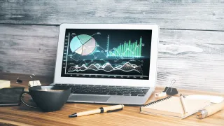 computer with investments displayed on screen