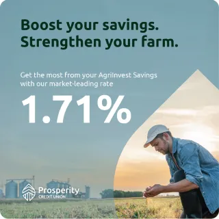 Farmer kneeling in soil, promotional agriinvest rate displayed