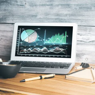 computer with investments displayed on screen